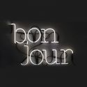 lettere scritta bonjour con trasformatore Neon Art